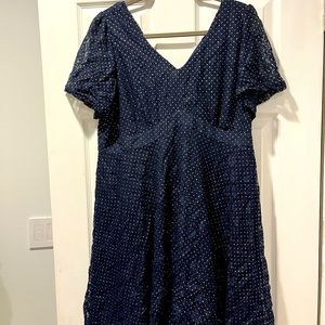 Navy blue maternity dress with gold sparkle.